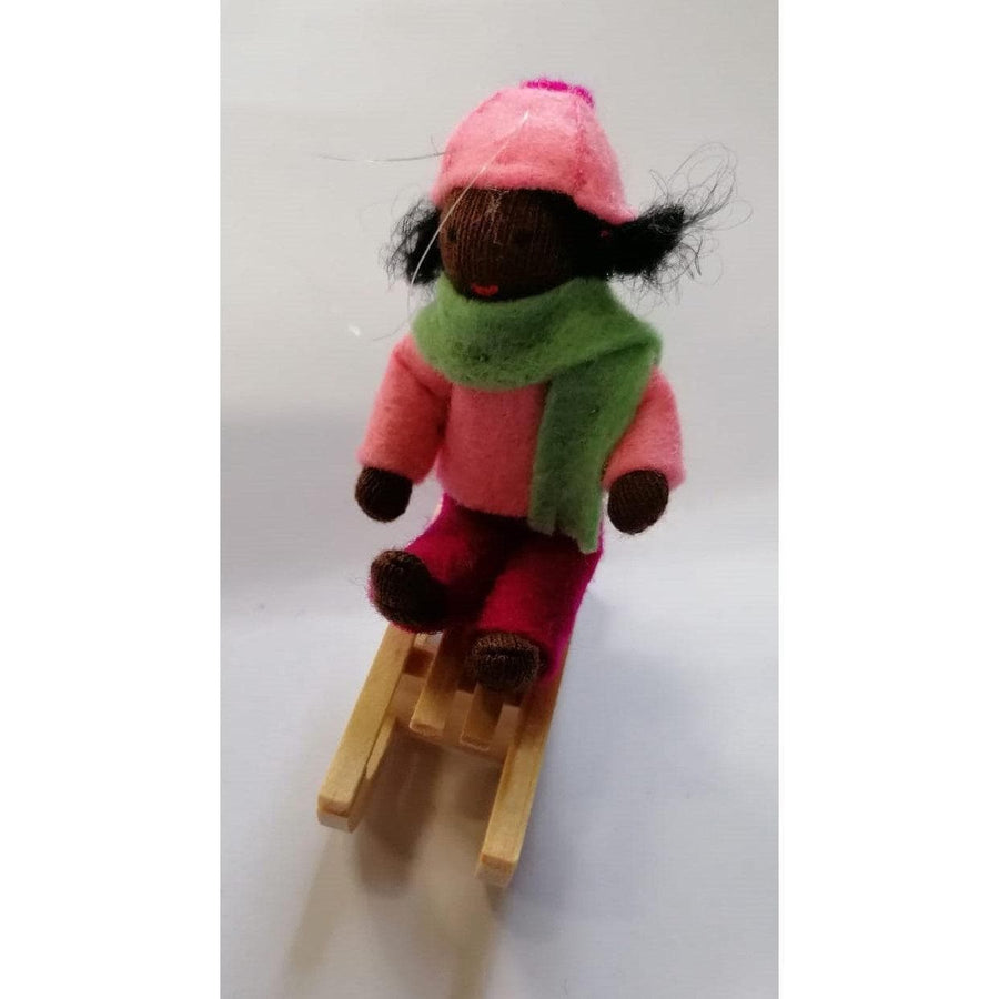 Girl on Sledge II Doll - Dark Skin